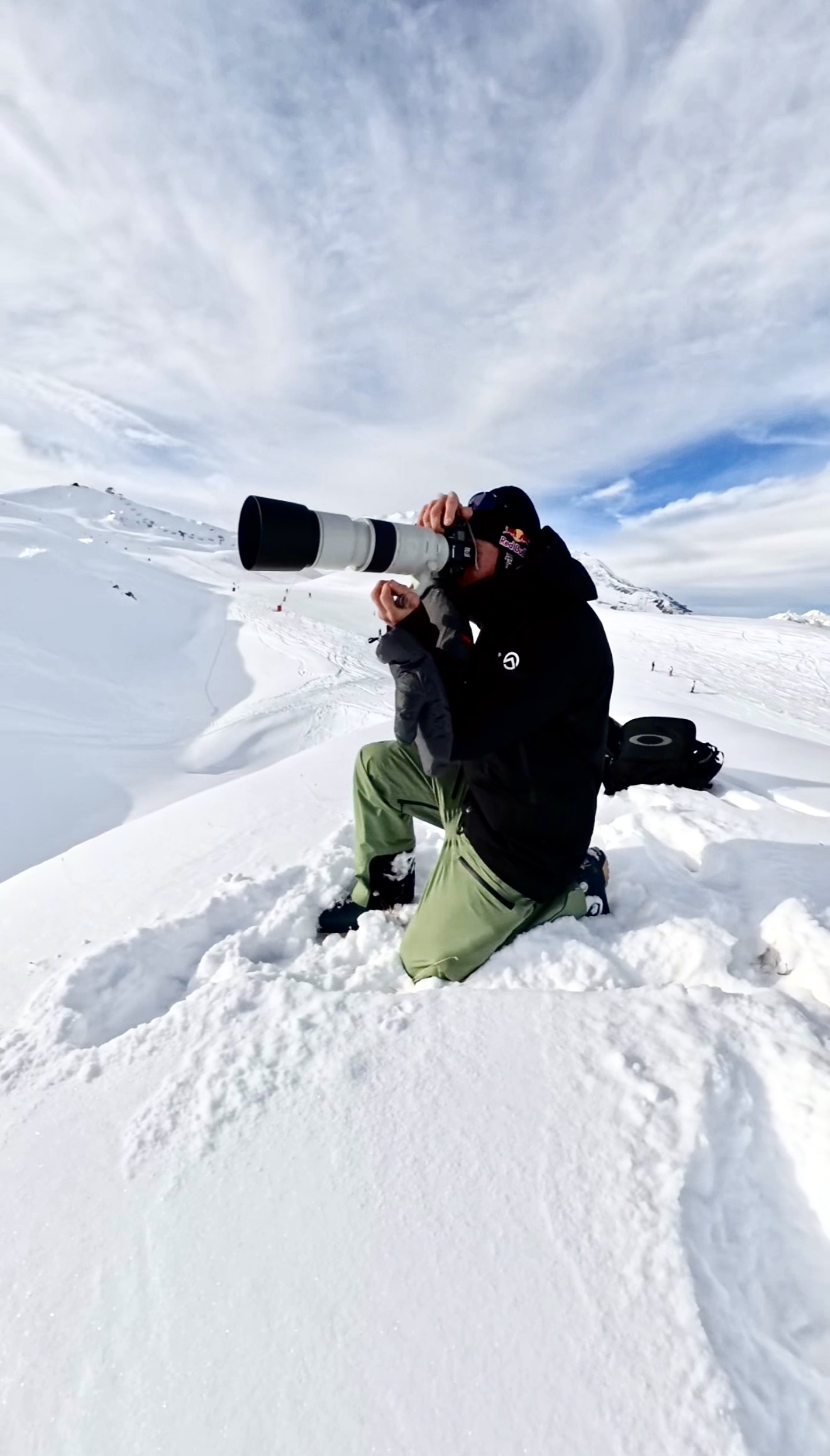 Pascal Prot, sports photographer, shooting with a telephoto lens on the slopes of Tignes
